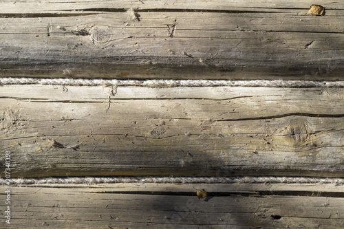 Natural painted wooden surface close-up, texture. Rustic wooden horizontal wood planks with cracks, scratches for modern design, patterns, background, copy space