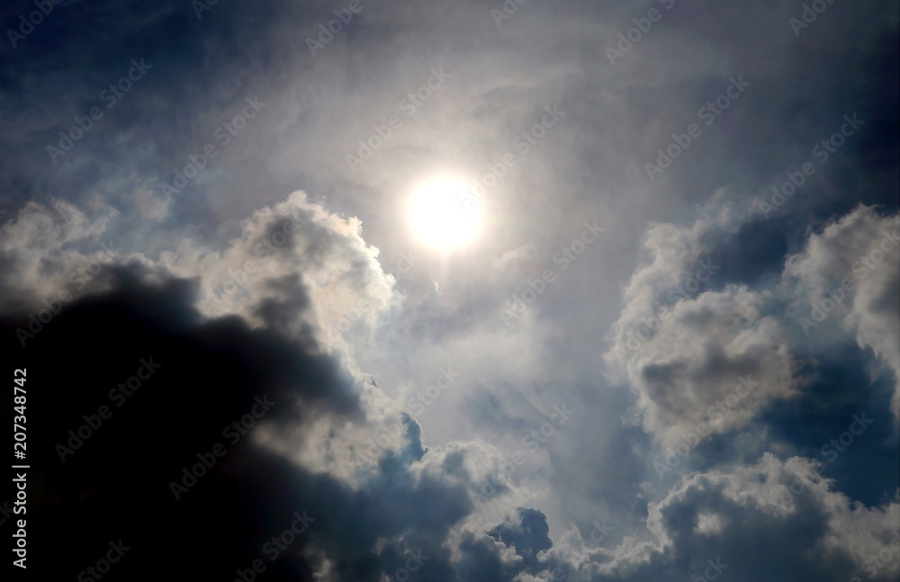 dark clound with blue sky and sun ray