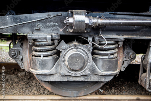 wheels of the railway car. Wheelbase of the train car close-up