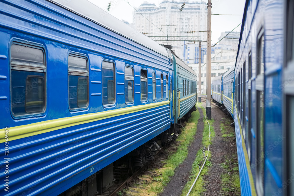 Fototapeta premium Classical cars of passenger train from outside. Many passenger cars.