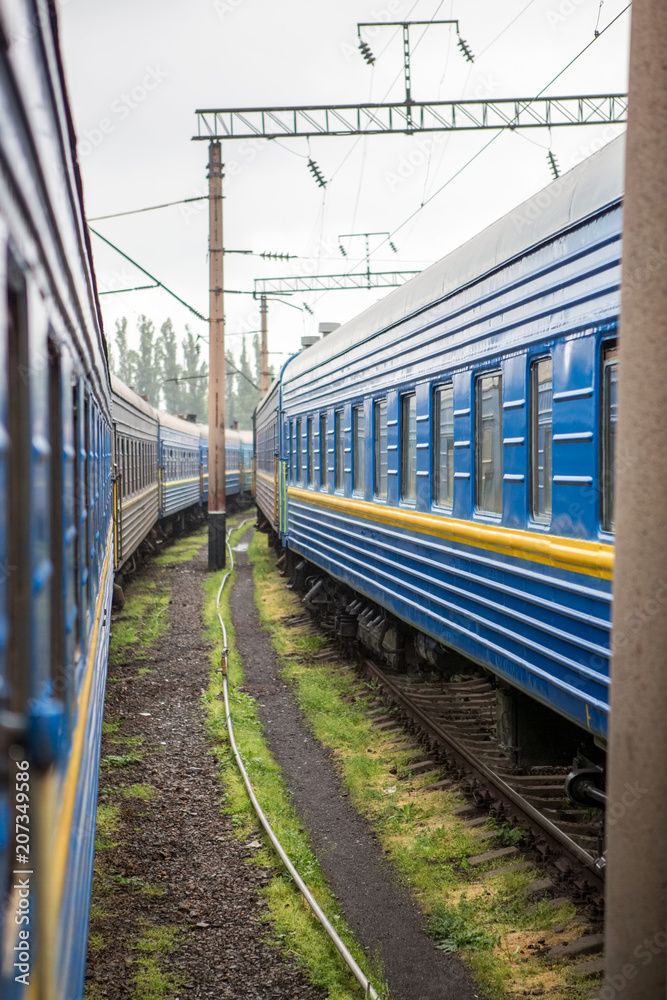 Fototapeta premium Classical cars of passenger train from outside. Many passenger cars.