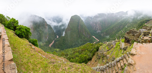 Panoramic view of the mountains surrounding Machu Picchu, with Putucusi in the middle, and Urubamba river photo