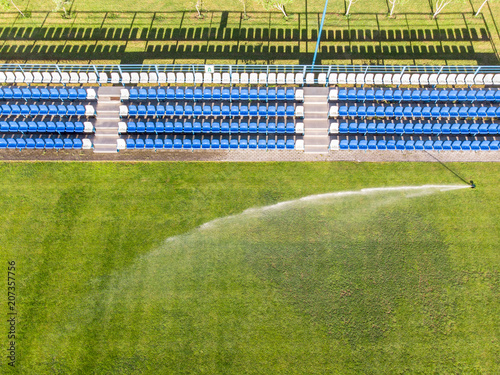 sprinkler watering football field. soccer field from above © Mr Twister
