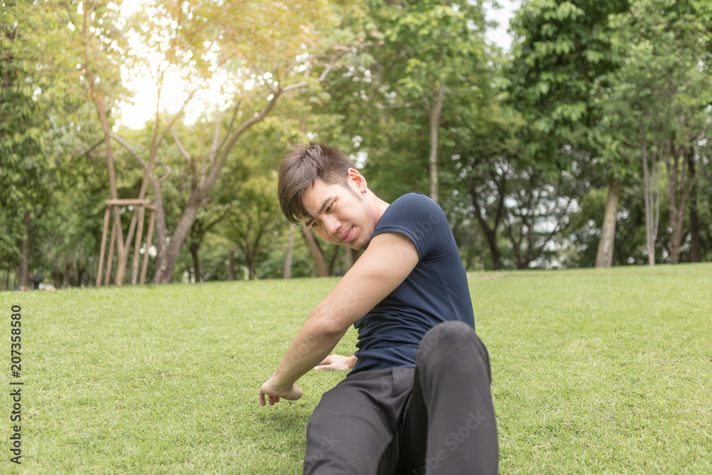 A young sportsman getting ready for athletic and fitness training outdoors. Healthy lifestyle concept with sunrise early morning. A young sportsman getting ready for athletic and fitness training outdoors. Healthy lifestyle concept with sunrise early morning.