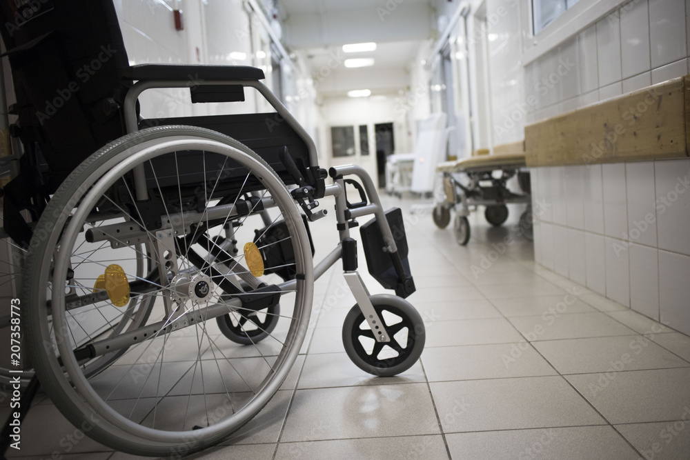 Wheel chair at corridor of hospital. Wheel chair at corridor of hospital.