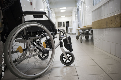 Wheel chair at corridor of hospital. photo