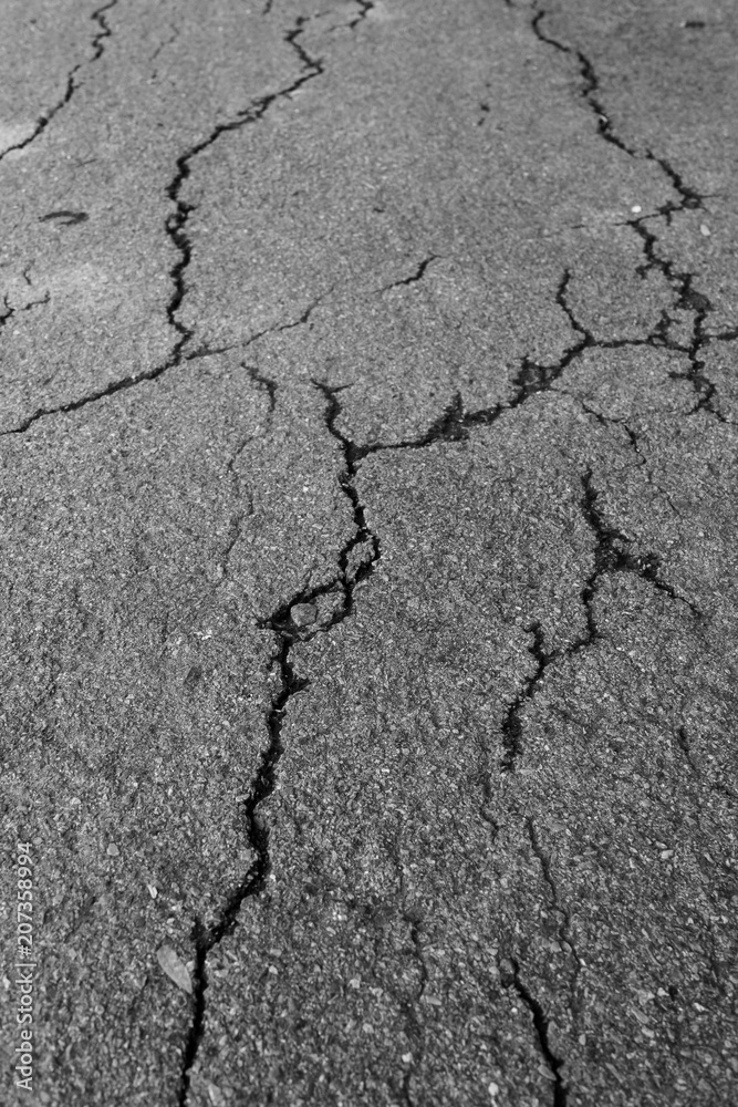 crack background texture of rough asphalt crack background texture of rough asphalt