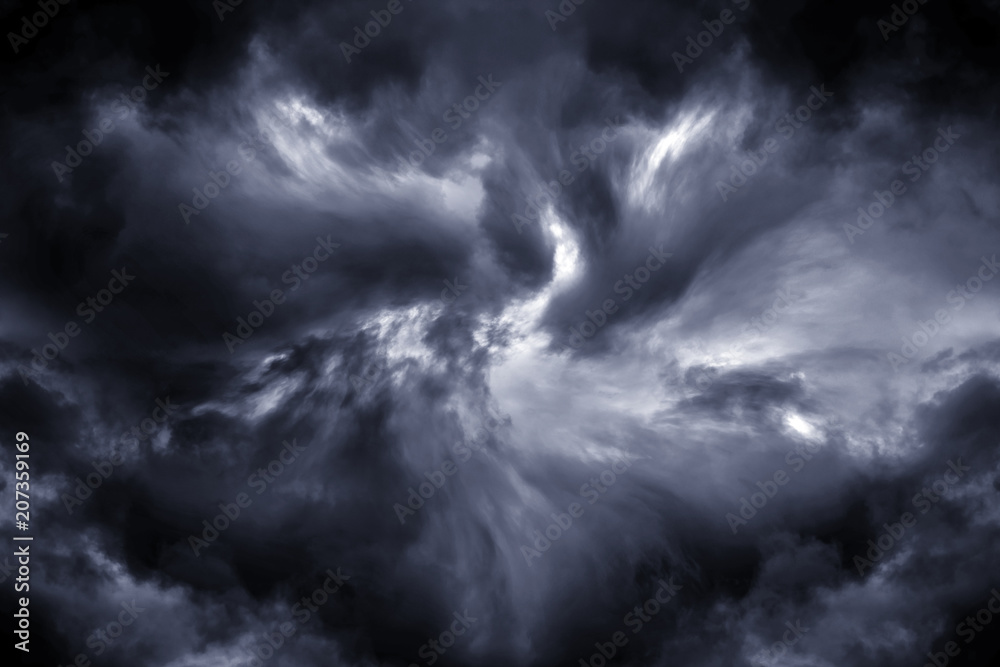 Obraz premium Light in the Dark and Dramatic Storm Clouds