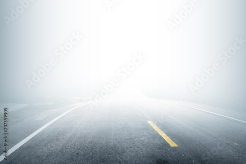 Road with fog in the morning