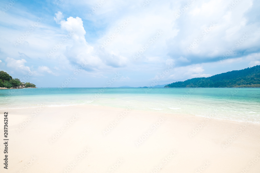 Beautiful white sand beach with soft ocean wave in summer time concept travel, holiday and vacation. Tropical paradise beach nature landscape at Lipe island in Thailand Beautiful white sand beach with soft ocean wave in summer time concept travel, holiday and vacation. Tropical paradise beach nature landscape at Lipe island in Thailand