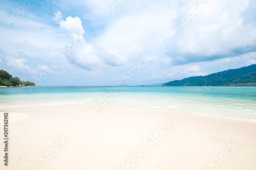 Beautiful white sand beach with soft ocean wave in summer time concept travel, holiday and vacation. Tropical paradise beach nature landscape at Lipe island in Thailand