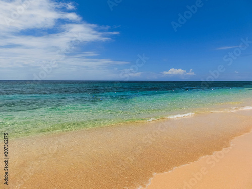 The sea and sand at Bamboo Beach in Jamaica