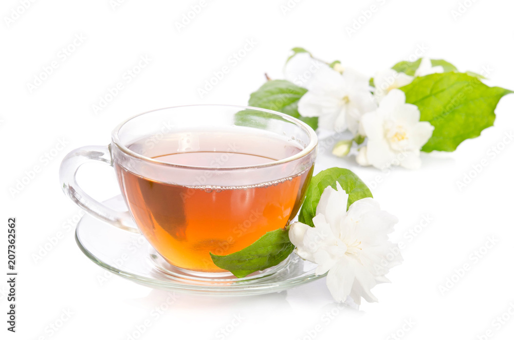 Glass cup of Tea with jasmine flowers and leaves isolated on white background Glass cup of Tea with jasmine flowers and leaves isolated on white background