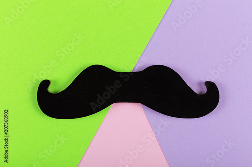 Father's Day. Minimalism. mustache. Symbol of Father's Day. colorful, paper, background photo