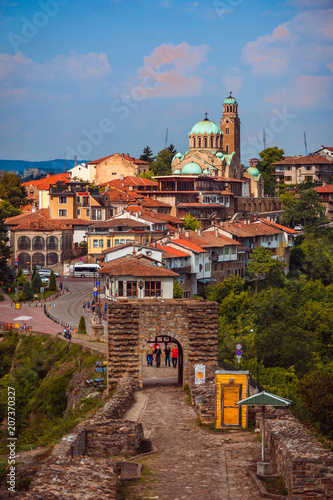 Beautiful view over the old town with a traditional architecture of Veliko Tarnovo on a sunny summer day in Bulgaria photo