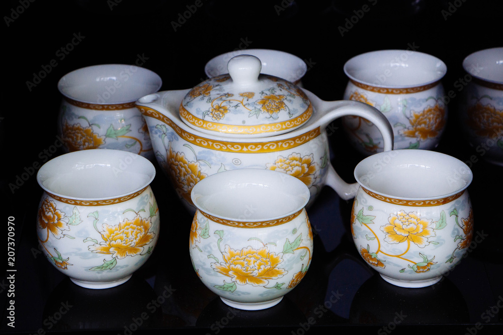 Teapot and cups are beautifully painted.