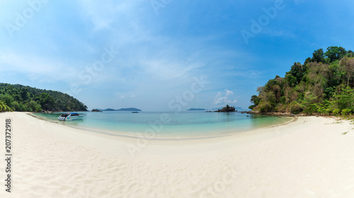 Bruer Island, amazing island from southern of Myanmar. A stunning seascape with turquoise water and white sand beach against blue sky at Bruer Island. Panoramic view © PRASERT