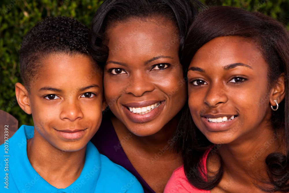 African American mother and her children. African American mother and her children.