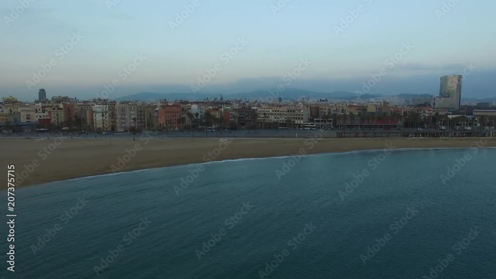 Aerial shot of beach in Barcelona at sunrise Aerial shot of beach in Barcelona at sunrise
