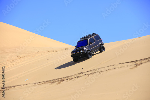Off-road vehicle traveling in the desert