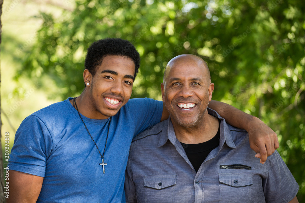 Father talking and spending time with his son. Father talking and spending time with his son.