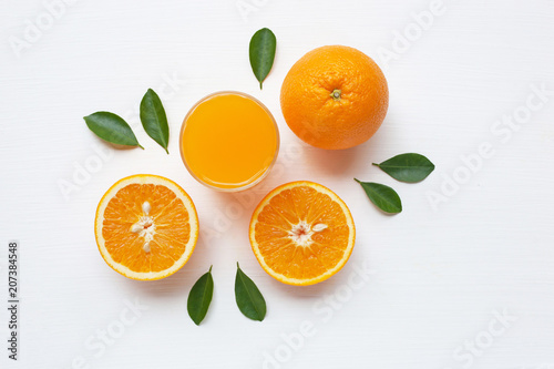 Fresh orange citrus fruit with leaves isolated on white backgrou
