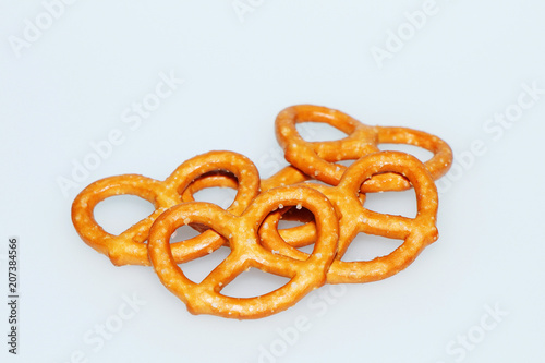 Biscuit. Salted crispy pretzels on a white background.