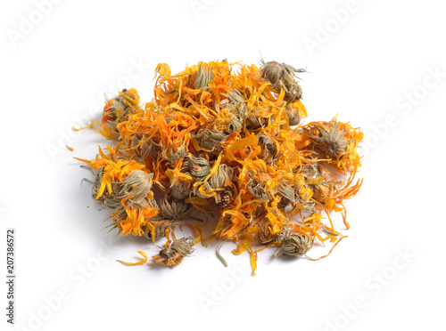 Dried medicinal herbs raw materials isolated on white. Flower Pot marigold (Calendula officinalis).