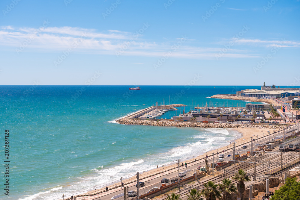 TARRAGONA, SPAIN – MAY 1, 2017: Port and railway station in Tarragona, Catalunya, Spain. Copy space for text.