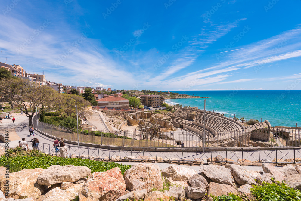 TARRAGONA, SPAIN – MAY 1, 2017: View of the ancient roman amphitheater. Copy space for text.