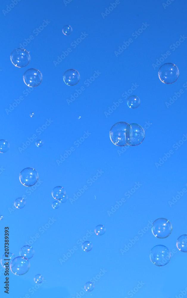 blue background with many soap bubbles