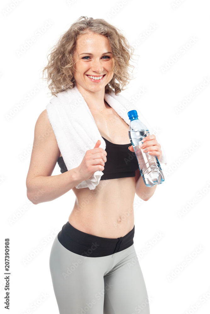 Portrait of happy smiling young woman in fitness wear with bottle of water Portrait of happy smiling young woman in fitness wear with bottle of water