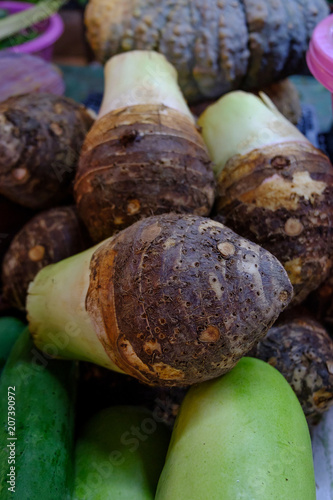 group of stcking raw Taro close-up fresh taro in fresh market photo