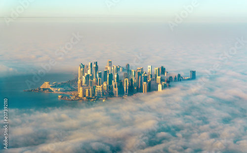 Aerial view of Doha through the morning fog - Qatar, the Persian Gulf