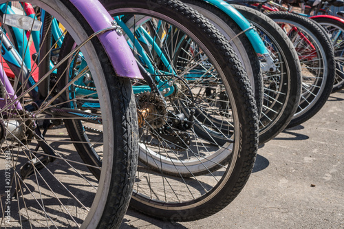A row of bicycles on the street. texture. background © semenenkostas