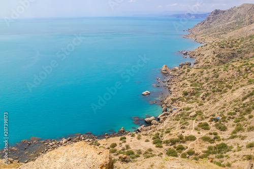 Sea and rocks landscape at Cape Meganom  the east coast of the peninsula of Crimea. Colorful background  travelling concept.