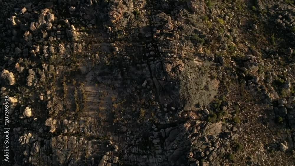 Top down aerial shot flying over rocky terrain in South Africa Top down aerial shot flying over rocky terrain in South Africa