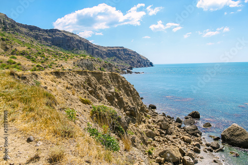 Sea and Mountains landscape at Cape Meganom, the east coast of the peninsula of Crimea. Beautiful nature, Colorful background. photo