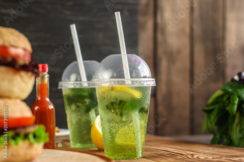 fresh mint lemonade - cold drink (a plastic glass of drink) - mojito