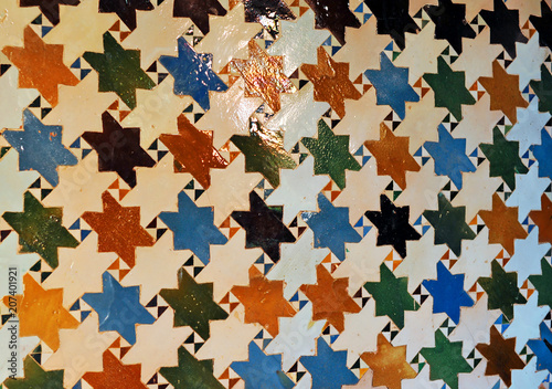 Arab mosaic from Palace of Alhambra in Granada, Andalusia, Spain