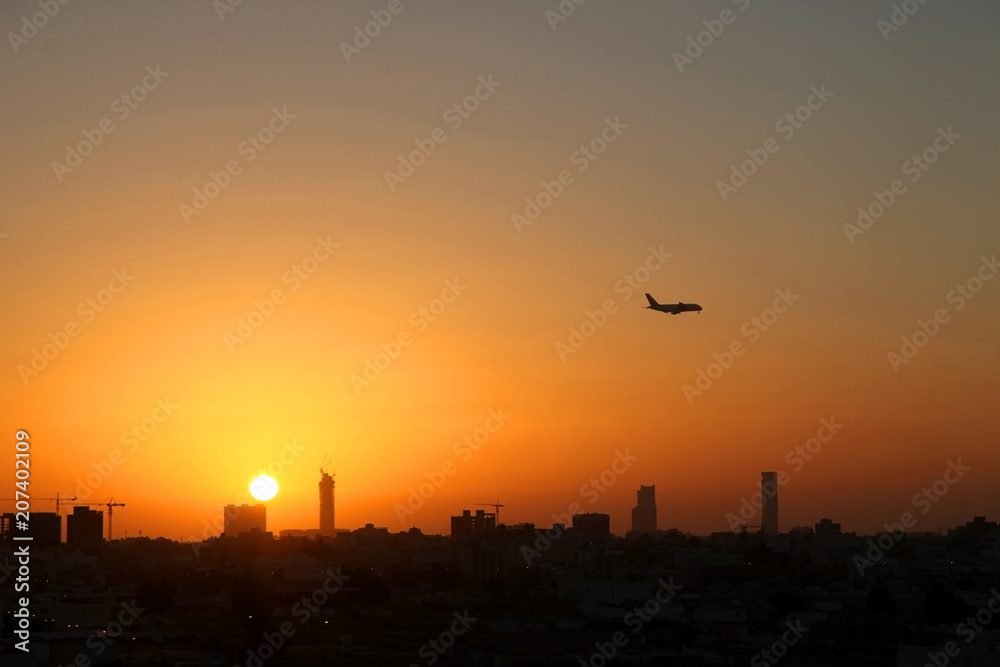 Evening sky with buildings silhouettes, Twilight sky background on cityscape in Jeddah Saudi Arabia, with copy space