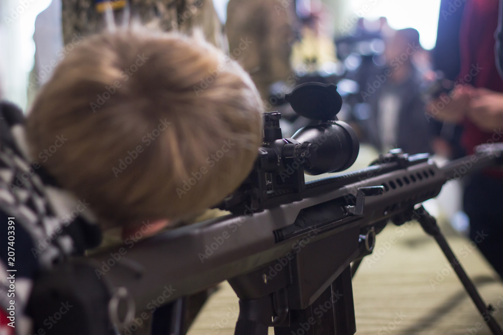 sub machine gun on the table in the interior gunsmith. sub machine gun on the table in the interior gunsmith.