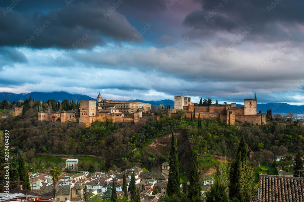 Cloudy view of La Alhambra, from Mirador de San Nicolás. Granada. Spain.