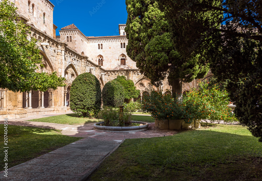 TARRAGONA, SPAIN - OCTOBER 4, 2017: View of the courtyard of the Tarragona Cathedral (Catholic cathedral) on a sunny day. Copy space for text.