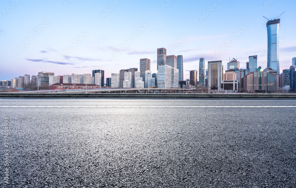 city skyline with asphalt road city skyline with asphalt road