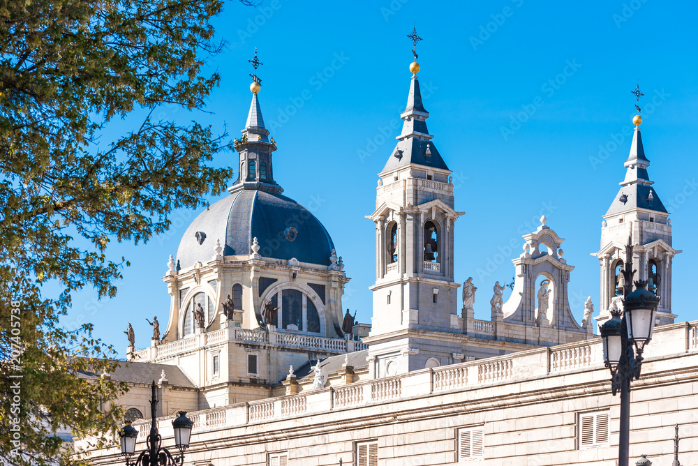MADRID, SPAIN - SEPTEMBER 26, 2017: Cathedral Almudena on the blue sky backgroun. Copy space for text.
