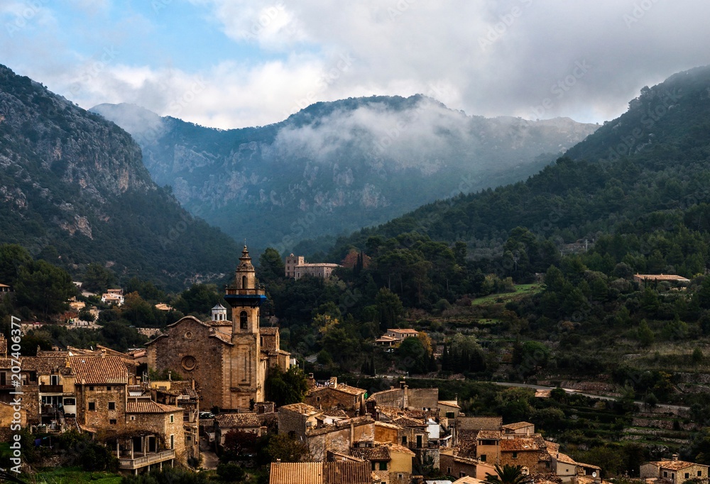 Small mediterranean village among mountains in Mallorca, Spain.