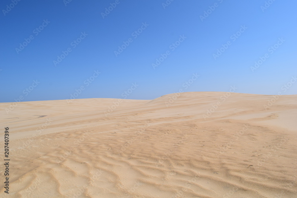 Sand Dune on a Bright Sunny Blue Cloudless Day With Nobody Around