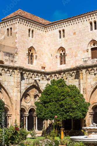 TARRAGONA  SPAIN - OCTOBER 4  2017  View of the courtyard of the Tarragona Cathedral  Catholic cathedral  on a sunny day. Copy space for text. Vertical.