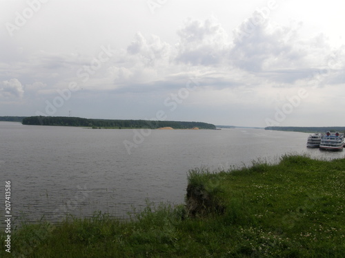 beauty in Nature  cloud-sky  day  environment  Grass  Green color  Land  Nature  no people  non-urban scene  outdoors  Plant  river  scenics-nature  sky  tranquil scene  Tranquility  water